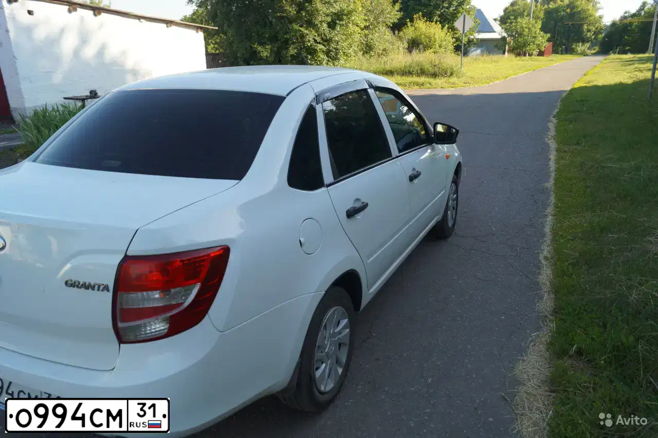 Фото автомобиля LADA 2190 GRANTA, 2015 — госномер Х789РН31. Цвет: Белый
