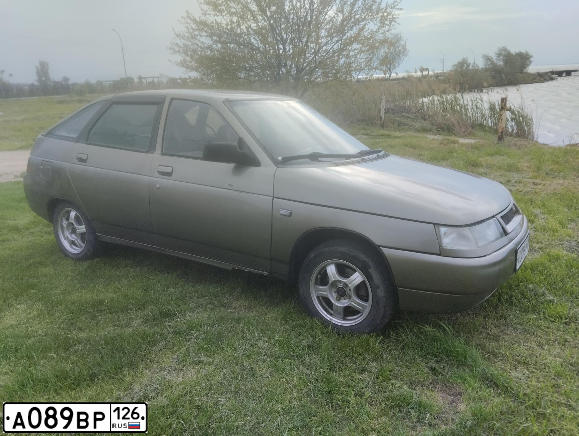 Фото автомобиля LADA 2112, 2002 — госномер Х449ВТ180. Цвет: СЕРО-ЗЕЛЕНЫЙ