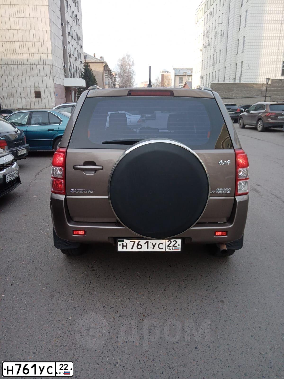 Фото автомобиля SUZUKI /GRAND/ VITARA, 2013 — госномер М555ОС42. Цвет: бронзовый