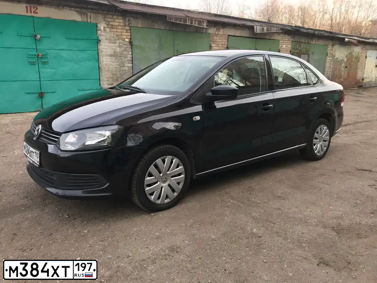 Фото автомобиля VOLKSWAGEN POLO, 2012 — госномер Х243УН69. Цвет: ЧЕРНЫЙ