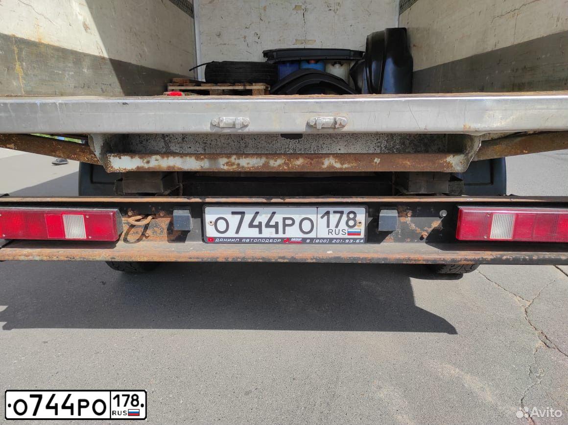 Фото автомобиля FORD TRANSIT, 2005 — госномер О744РО178. Цвет: Белый