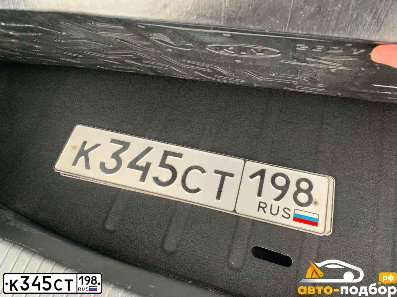 Фото автомобиля KIA RIO, 2009 — госномер К345СТ198. Цвет: СЕРЫЙ