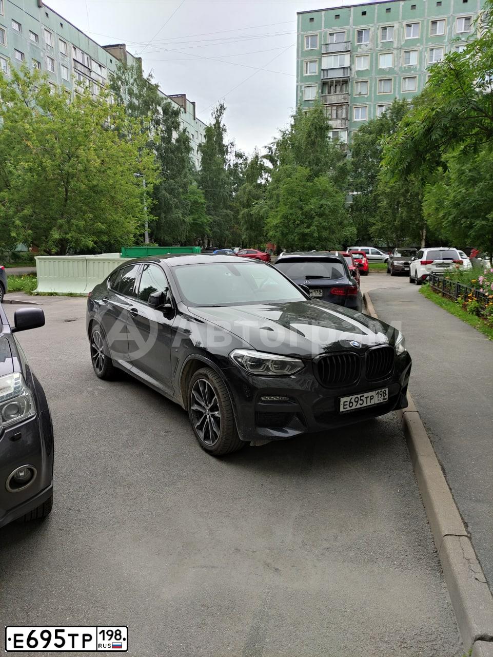 Фото автомобиля BMW X4, 2020 — госномер Е695ТР198. Цвет: ЧЕРНЫЙ