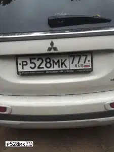 Фото автомобиля MITSUBISHI OUTLANDER, 2014 — госномер Р528МК777. Цвет: Белый