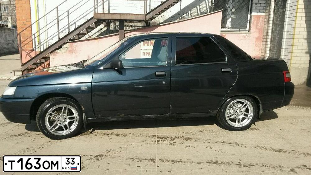 Фото автомобиля LADA 2110, 2004 — госномер М021УТ33. Цвет: ЧЕРНЫЙ
