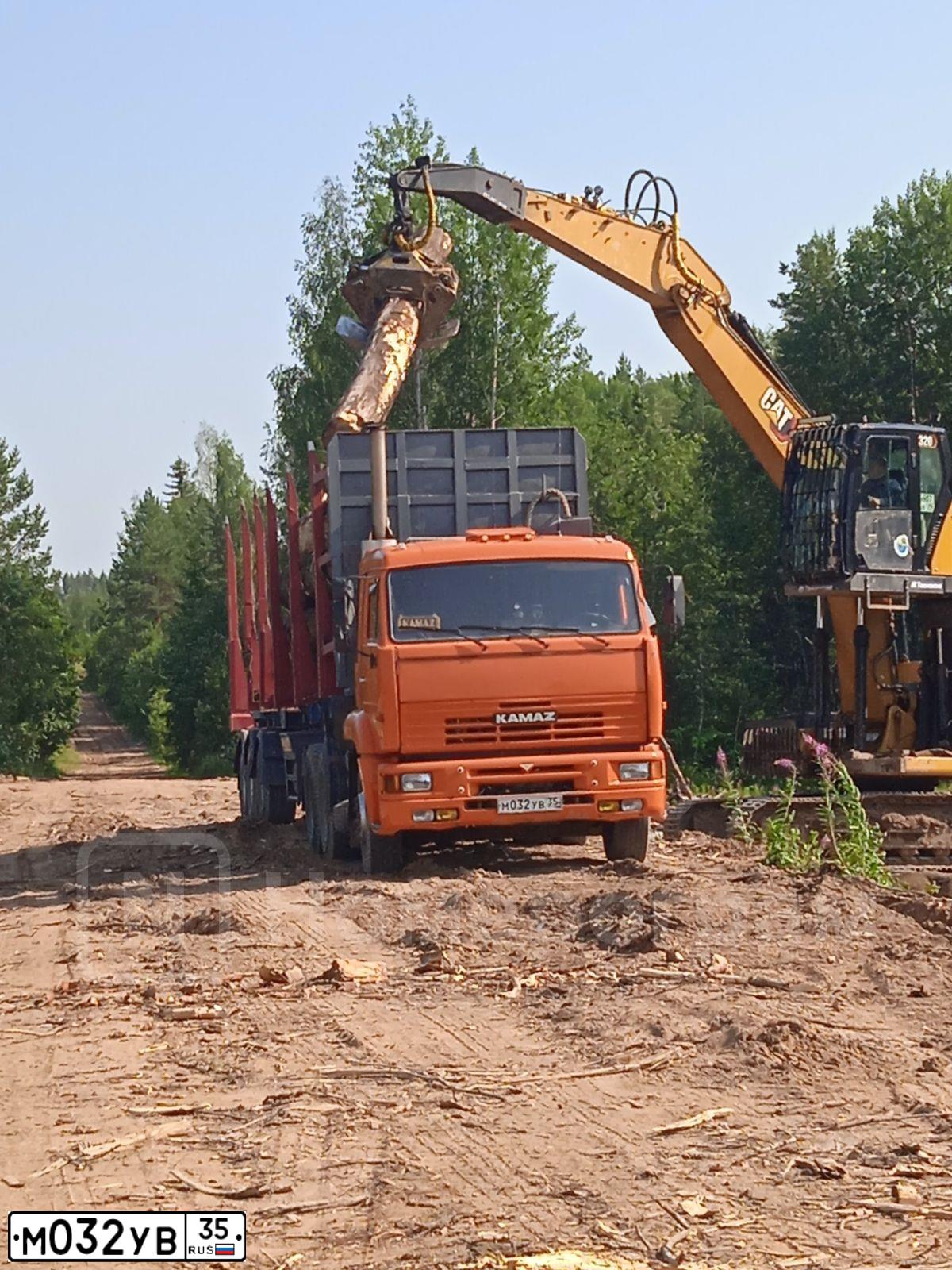 Фото автомобиля KAMAZ 6460 /6X4/, 2010 — госномер Е009ХХ35. Цвет: Оранжевый