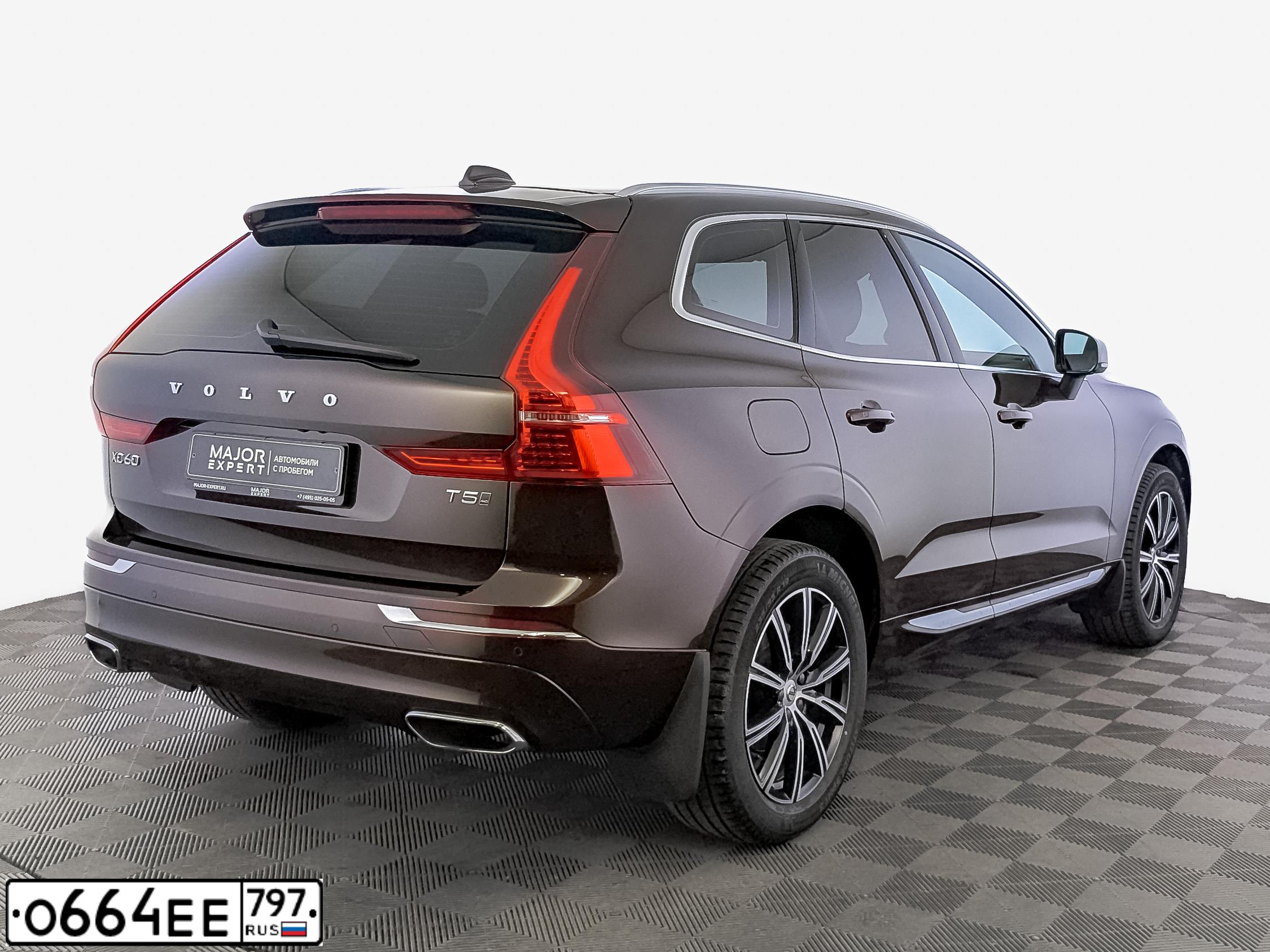 Фото автомобиля VOLVO XC60, 2021 — госномер Х501УУ799. Цвет: Коричневый