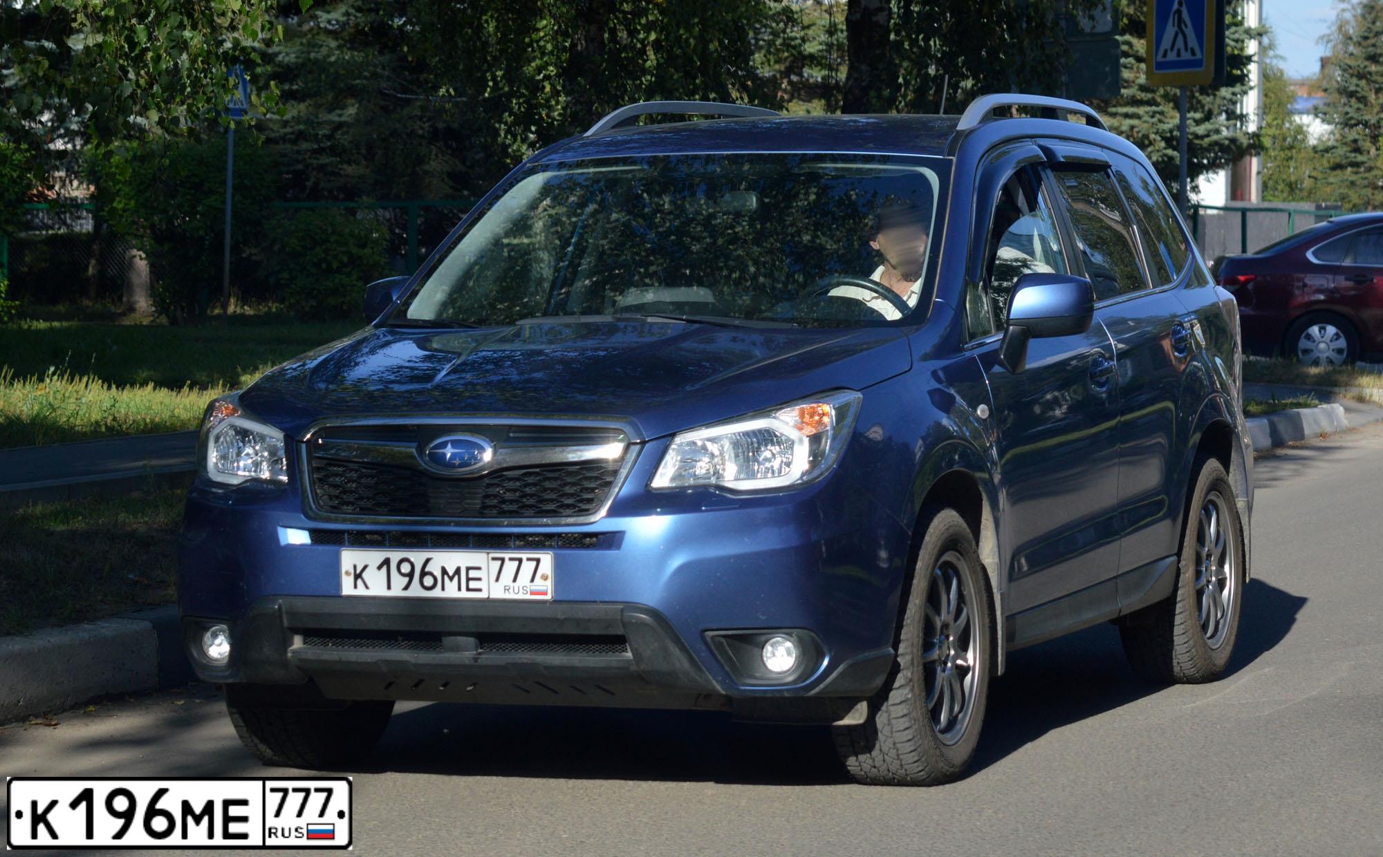 Фото автомобиля SUBARU FORESTER, 2014 — госномер К196МЕ777. Цвет: СИНИЙ