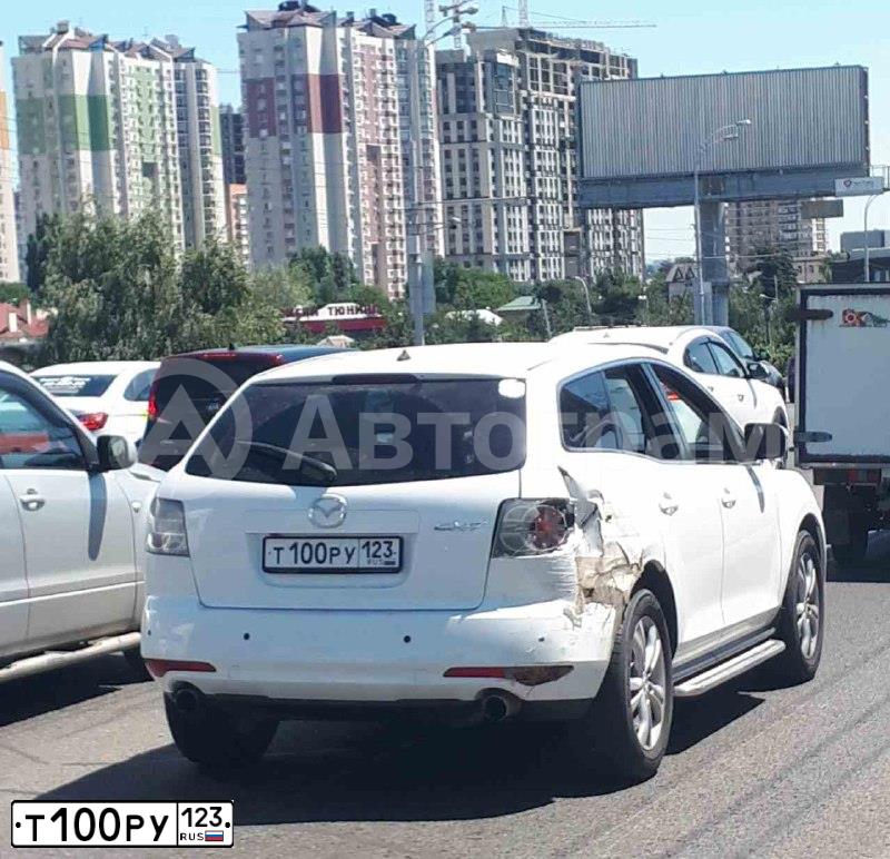 Фото автомобиля MAZDA CX-7, 2011 — госномер Т100РУ123. Цвет: БЕЛЫЙ