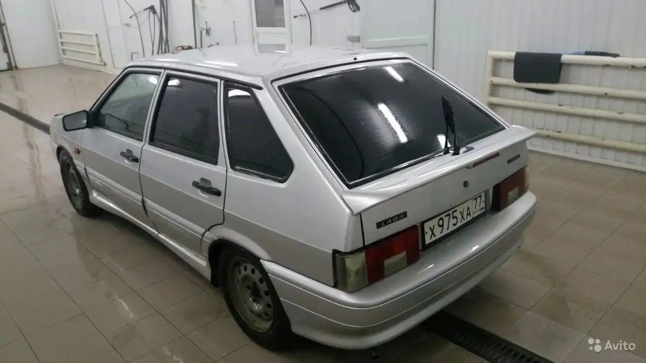 Фото автомобиля LADA 2114 SAMARA, 2007 — госномер Х975ХА77. Цвет: СВЕТЛО-СЕРЫЙ МЕТАЛЛ