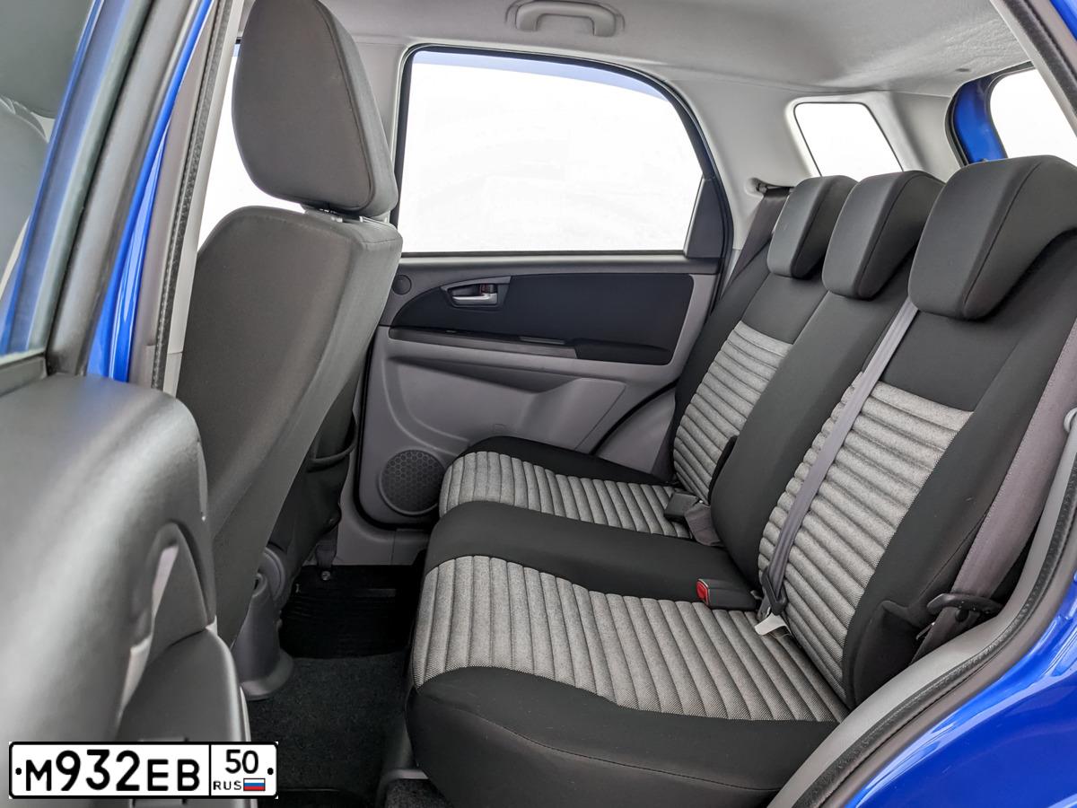 Фото автомобиля SUZUKI SX 4, 2013 — госномер Т204ЕС977. Цвет: синий