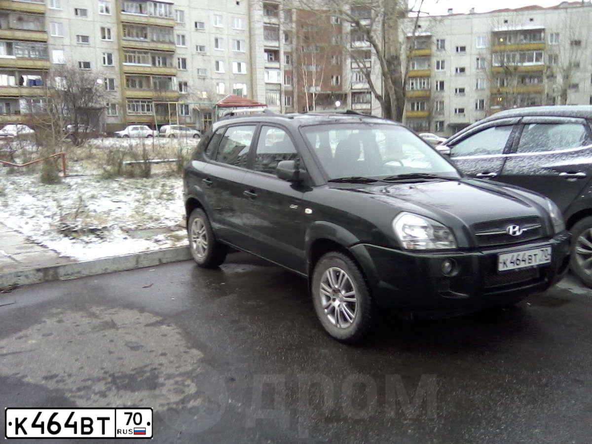 Фото автомобиля HYUNDAI TUCSON, 2006 — госномер К464ВТ70. Цвет: ТЕМНО-ЗЕЛЕНЫЙ