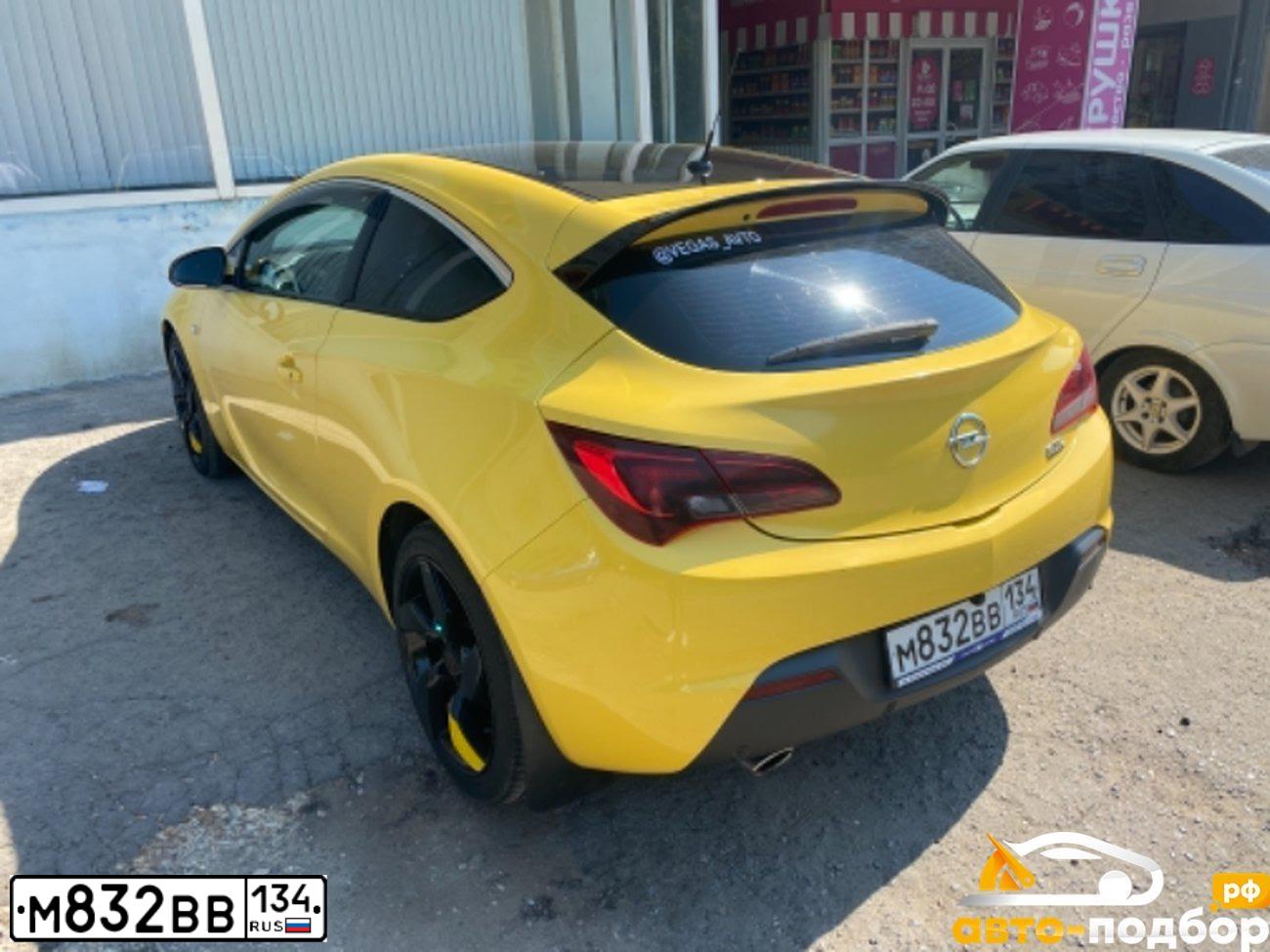 Фото автомобиля OPEL ASTRA, 2013 — госномер Х606ЕХ26. Цвет: ЖЕЛТЫЙ