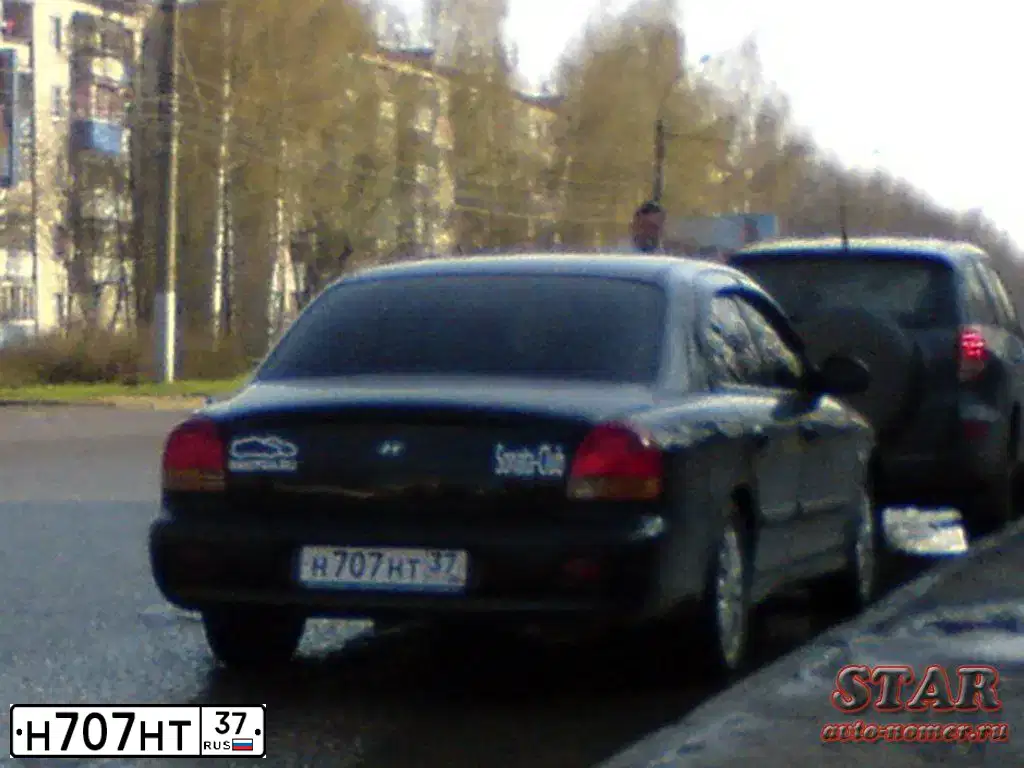 Фото автомобиля HYUNDAI SONATA, 2001 — госномер Н707НТ37. Цвет: ЧЕРНЫЙ