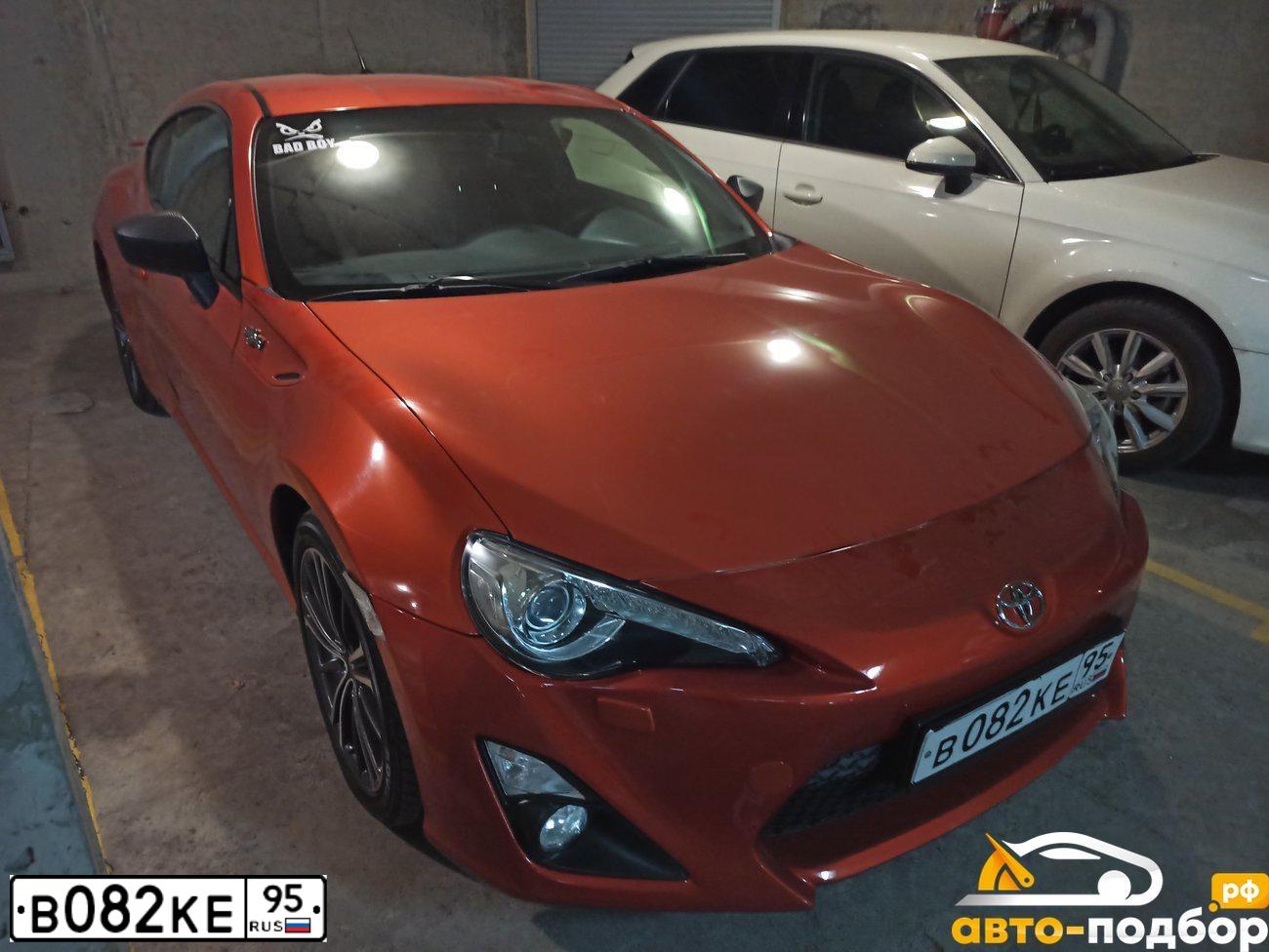 Фото автомобиля TOYOTA GT 86, 2012 — госномер В111УМ123. Цвет: Оранжевый