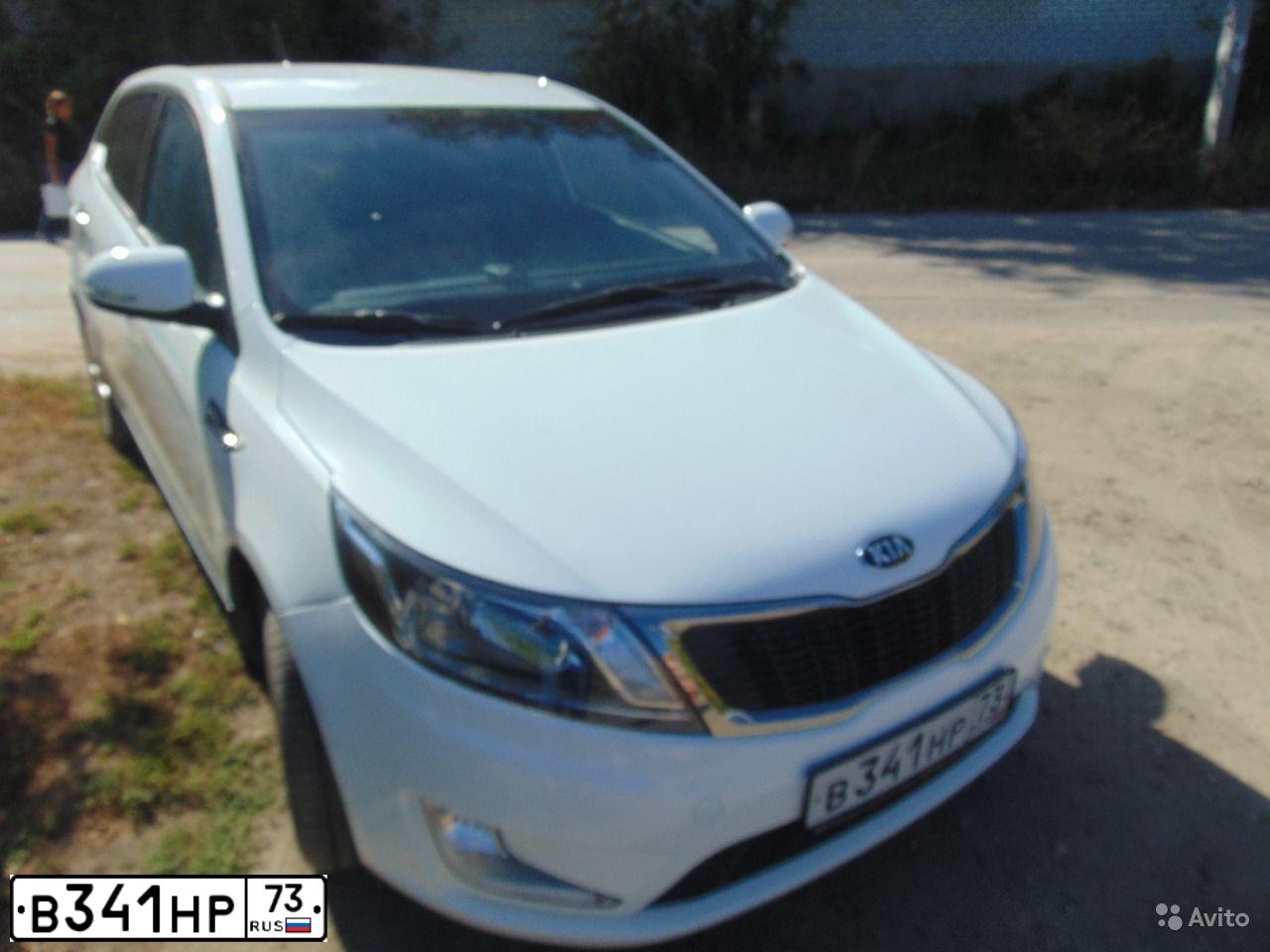 Фото автомобиля KIA RIO, 2014 — госномер В341НР73. Цвет: Белый
