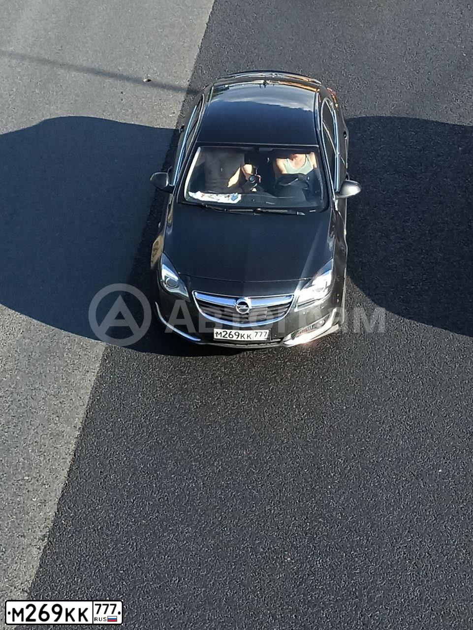 Фото автомобиля OPEL INSIGNIA, 2014 — госномер Е952ТМ69. Цвет: ЧЕРНЫЙ
