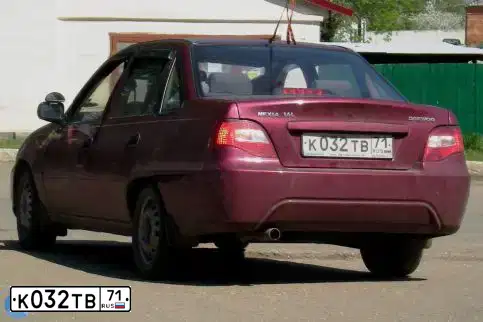 Фото автомобиля DAEWOO NEXIA, 2009 — госномер О653ВА71. Цвет: СПЕЛАЯ ВИШНЯ
