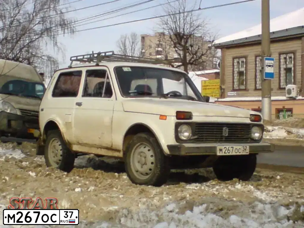 Фото автомобиля LADA 2121 NIVA, 1997 — госномер М267ОС37. Цвет: БЕЛЫЙ