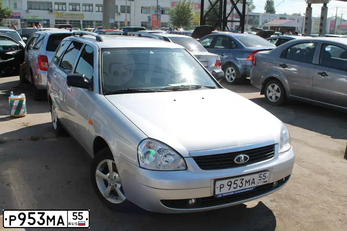Фото автомобиля LADA 2171 PRIORA, 2010 — госномер С482УН55. Цвет: СЕРЕБРИСТЫЙ
