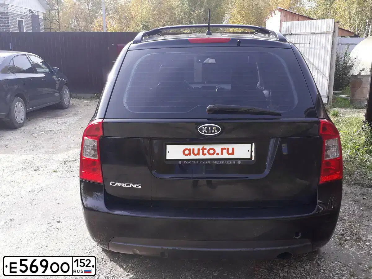Фото автомобиля KIA CARENS, 2007 — госномер Т499РМ152. Цвет: ТЕМНО-БОРДОВЫЙ
