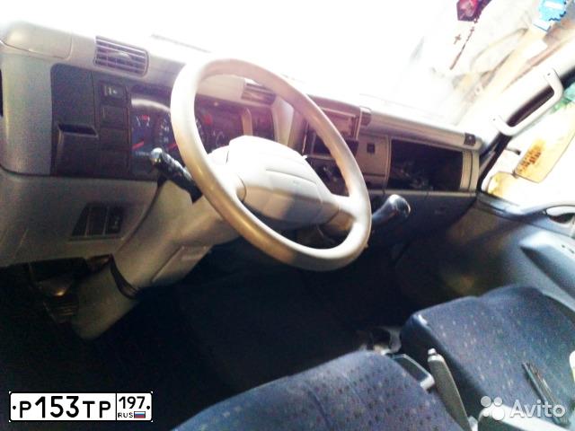Фото автомобиля FUSO CANTER, 2008 — госномер Т650КО790. Цвет: Белый