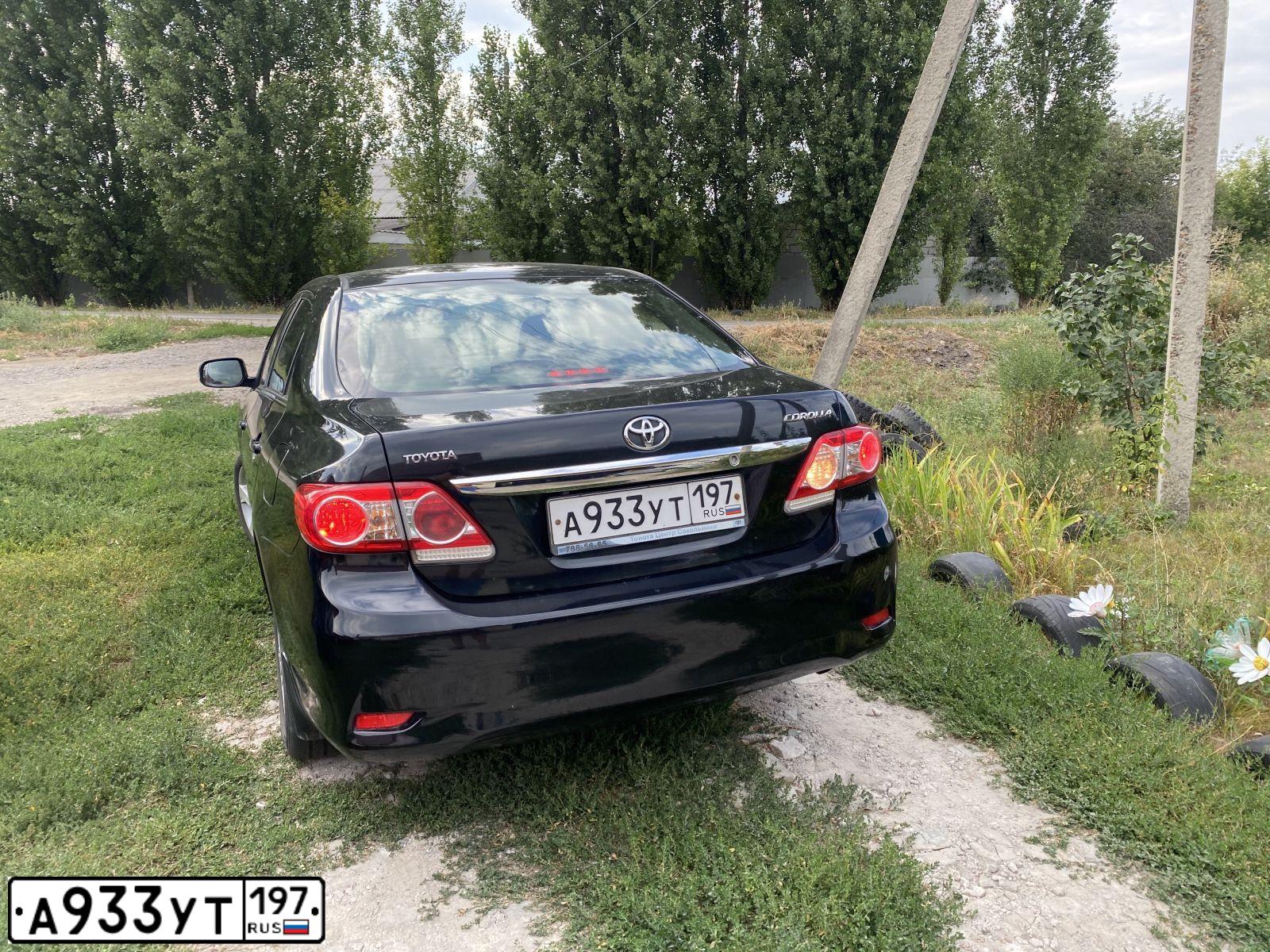 Фото автомобиля TOYOTA COROLLA, 2011 — госномер Е036ЕА136. Цвет: ЧЕРНЫЙ