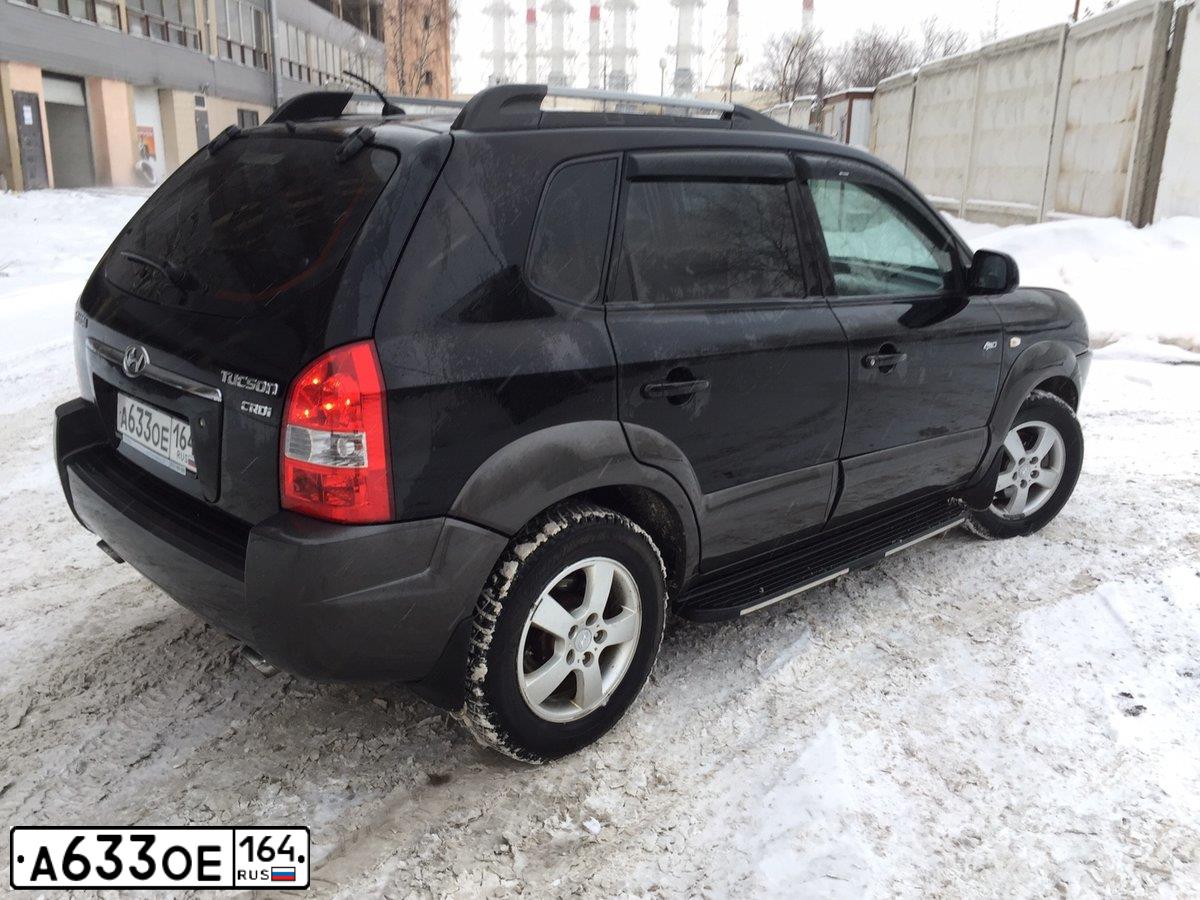 Фото автомобиля HYUNDAI TUCSON, 2008 — госномер М170СР123. Цвет: ЧЕРНЫЙ