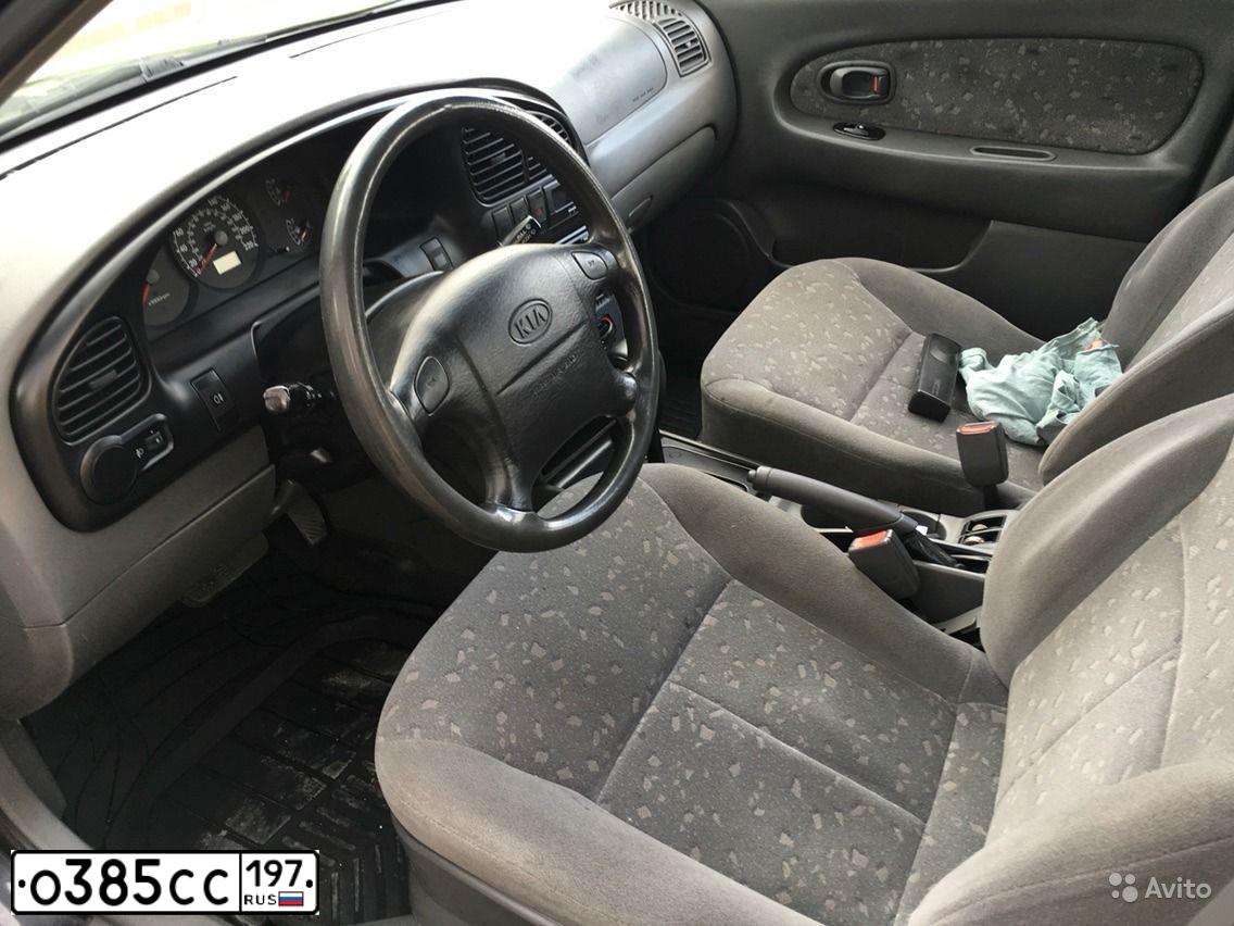 Фото автомобиля KIA SPECTRA, 2008 — госномер В957ТН777. Цвет: ЧЕРНЫЙ ЖЕМЧУГ