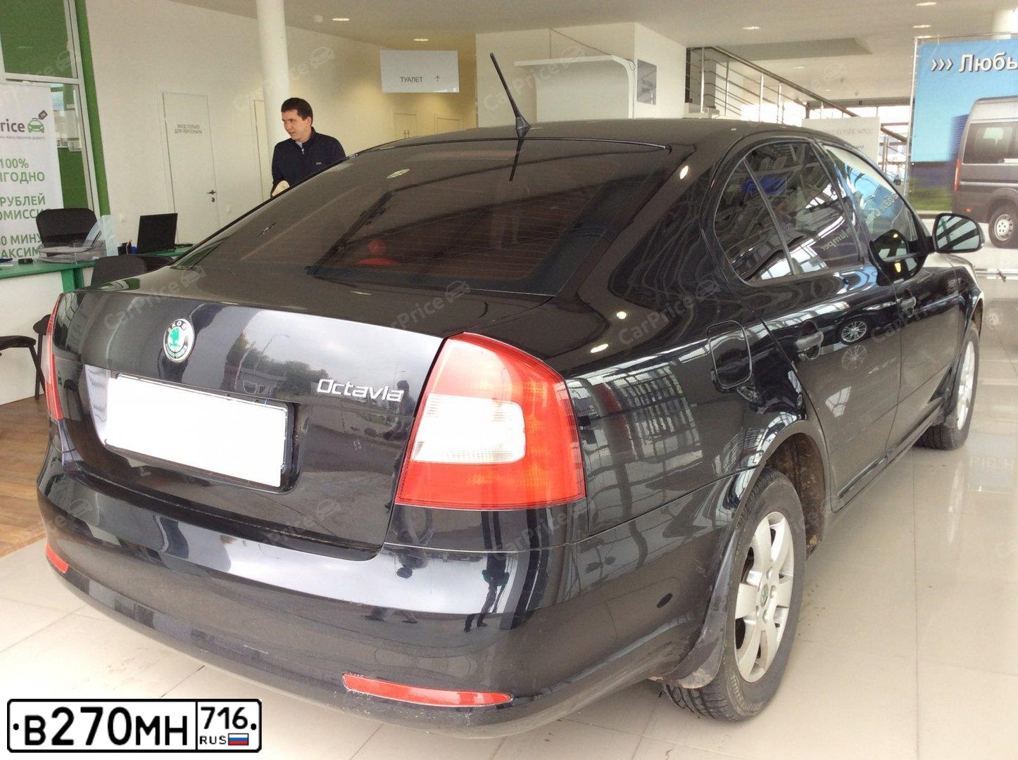 Фото автомобиля SKODA OCTAVIA, 2011 — госномер Н051УС702. Цвет: ЧЕРНЫЙ