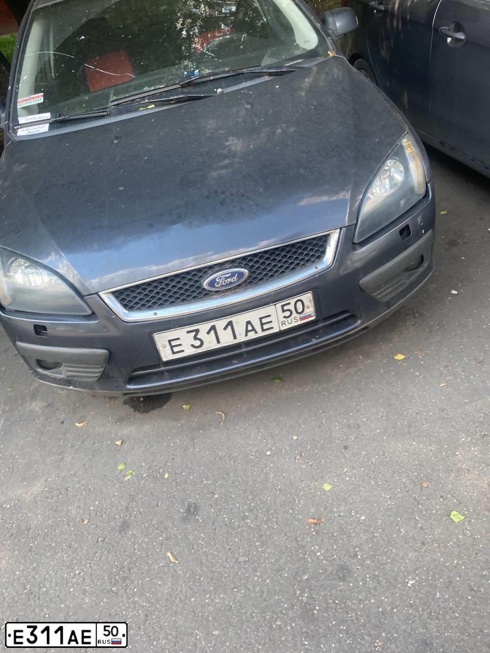 Фото автомобиля FORD FOCUS, 2007 — госномер Е311АЕ50. Цвет: СЕРЫЙ ТЕМНЫЙ