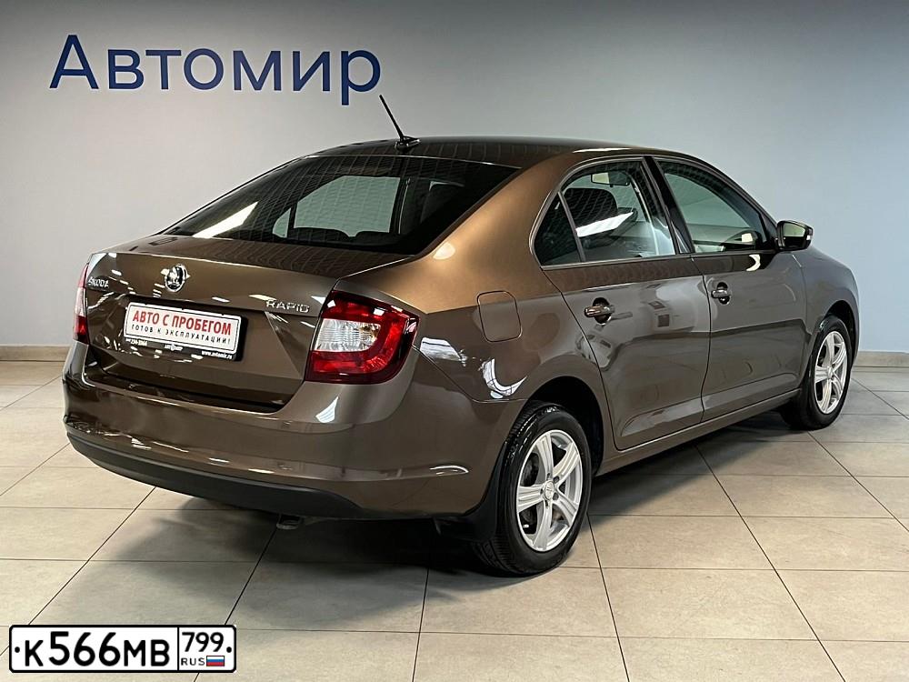 Фото автомобиля SKODA RAPID, 2018 — госномер К566МВ799. Цвет: Коричневый