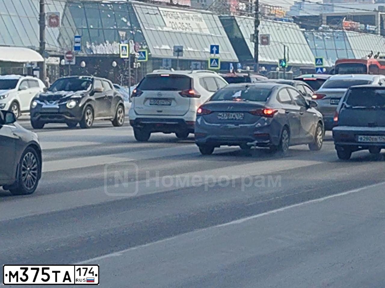 Фото автомобиля LADA 2190 GRANTA, 2015 — госномер М375ТА174. Цвет: ЧЕРНЫЙ