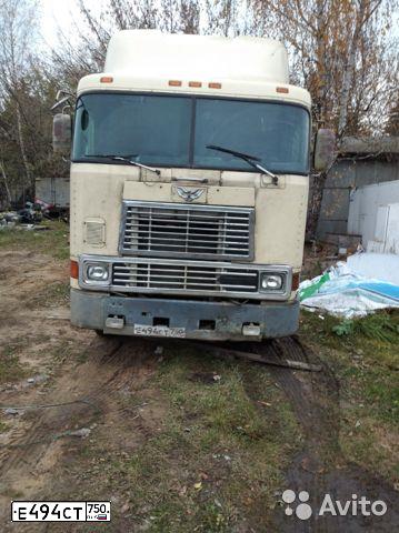 Фото автомобиля INTERNATIONAL HEAVY TRUCK 8500-9900, 1998 — госномер Е494СТ750. Цвет: БЕЖЕВЫЙ СВЕТЛЫЙ