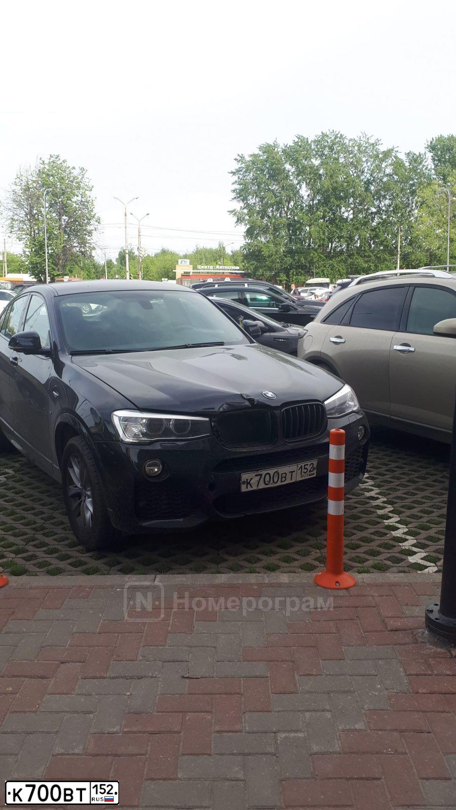 Фото автомобиля BMW X1, 2012 — госномер К700ВТ152. Цвет: Коричневый