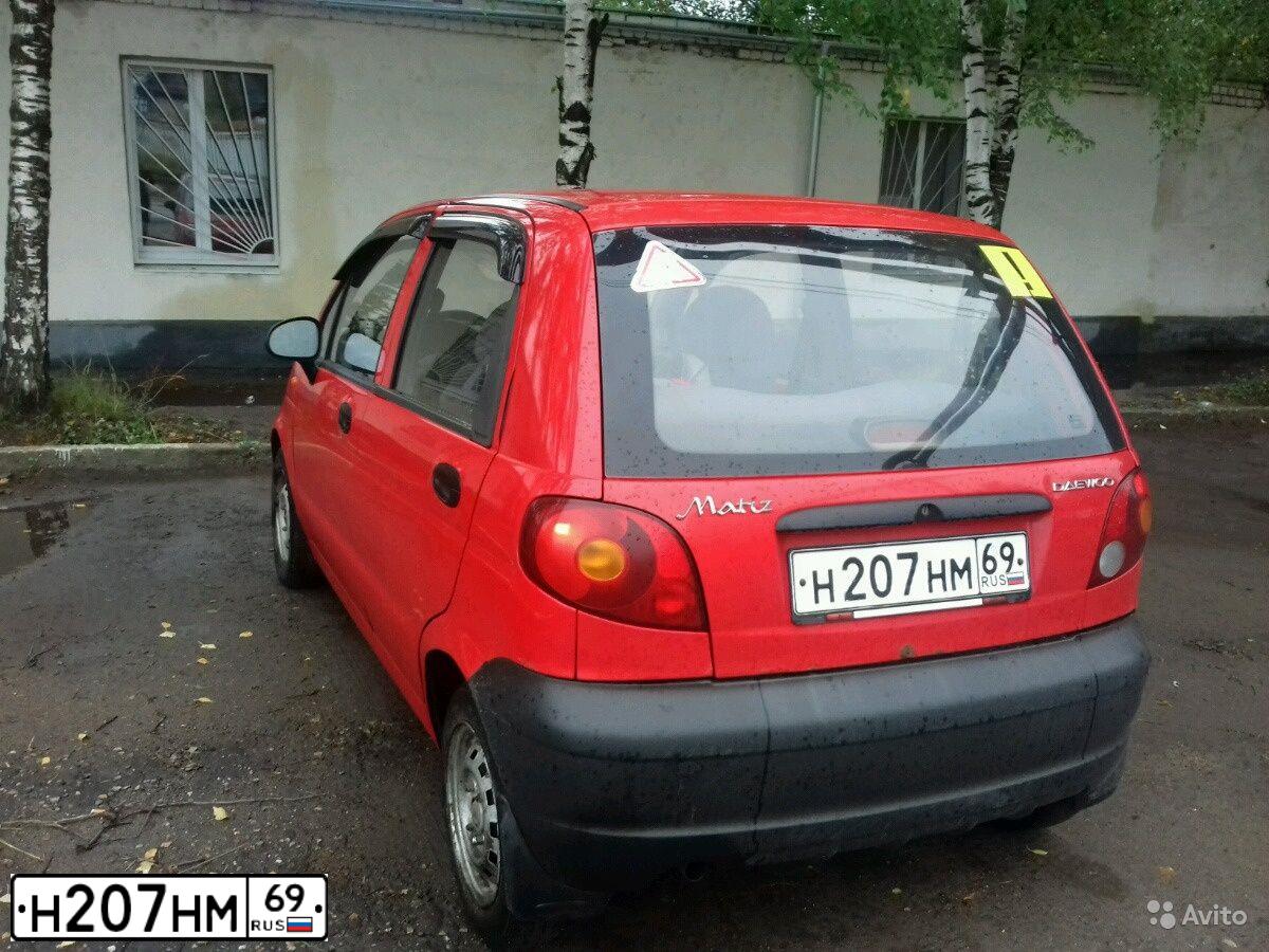 Фото автомобиля DAEWOO MATIZ, 2009 — госномер Н885МА977. Цвет: Красный