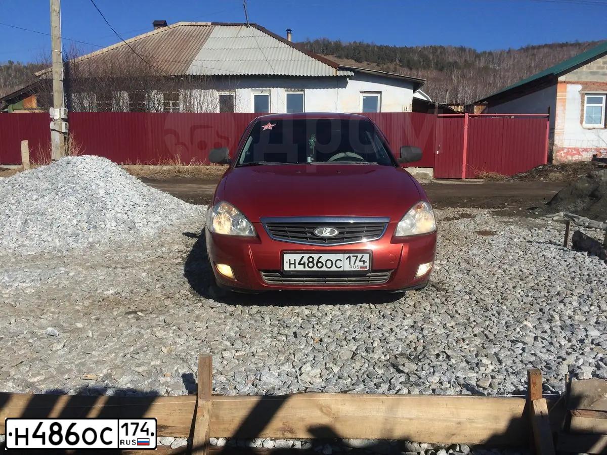 Фото автомобиля LADA 2170 PRIORA, 2007 — госномер Н486ОС174. Цвет: ЗОЛОТИСТО-КРАСНЫЙ