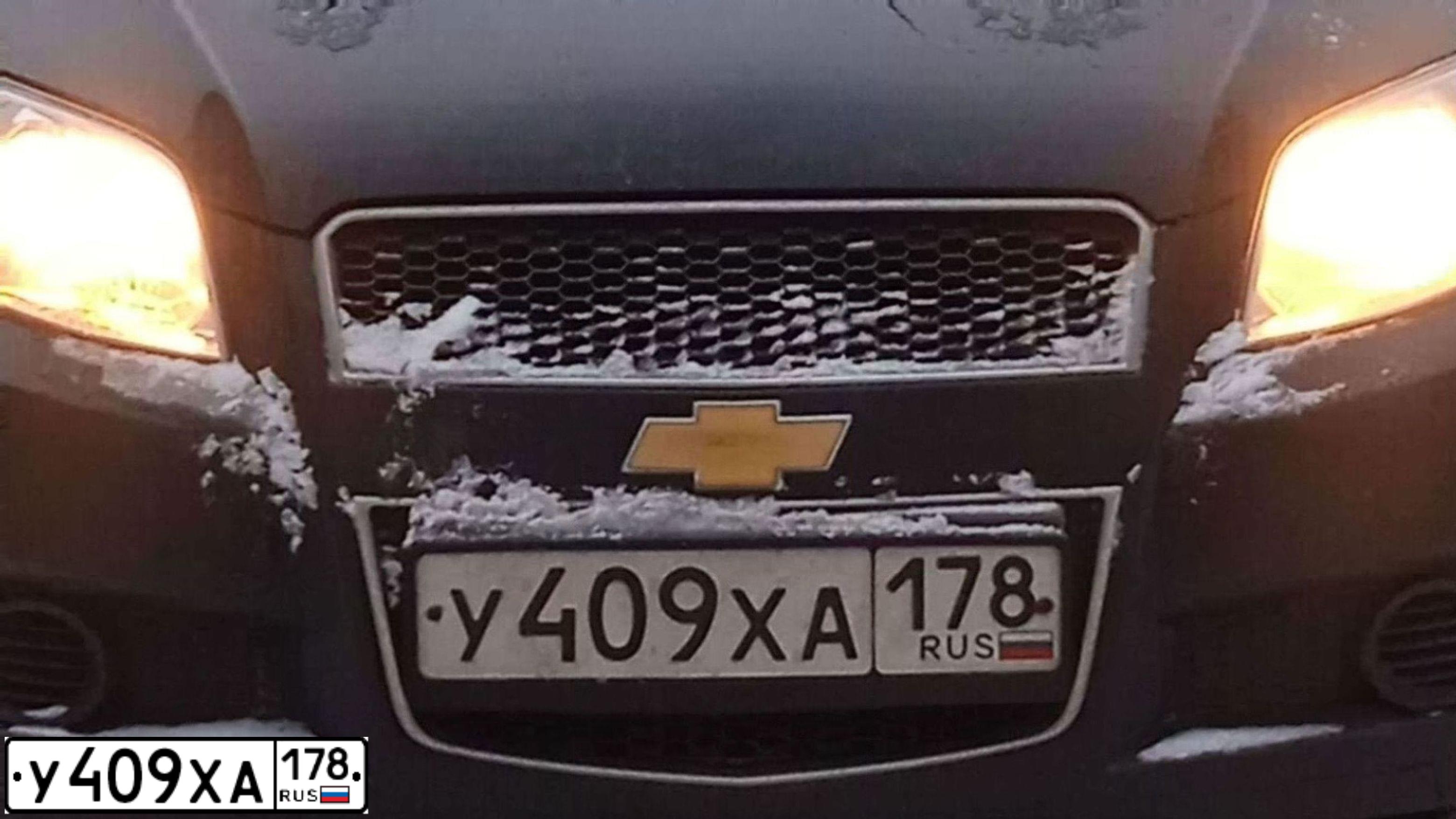 Фото автомобиля CHEVROLET AVEO, 2010 — госномер Х754ОК31. Цвет: ЧЕРНЫЙ