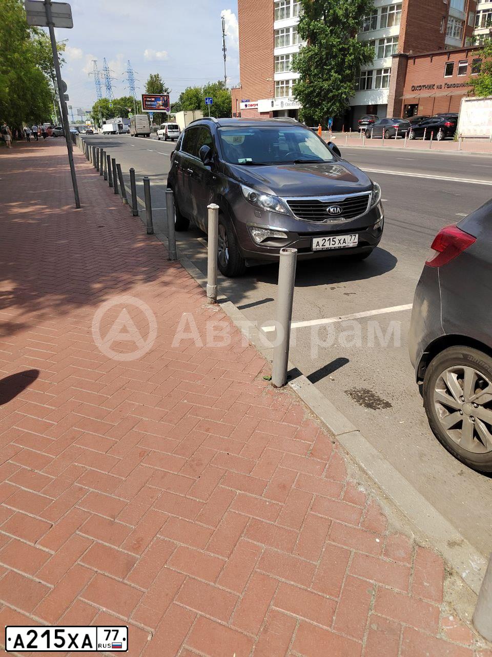 Фото автомобиля KIA SPORTAGE, 2013 — госномер А215ХА77. Цвет: СЕРЫЙ