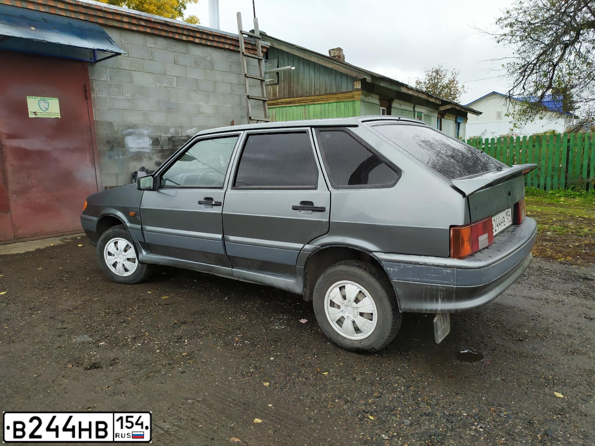 Фото автомобиля LADA 2114 SAMARA, 2006 — госномер В244НВ70. Цвет: СРЕДНИЙ СЕРО-ЗЕЛЕНЫЙ МЕТАЛЛИК