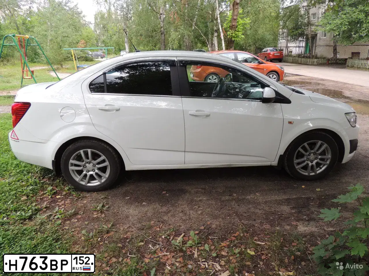Фото автомобиля CHEVROLET AVEO, 2014 — госномер Р088МХ152. Цвет: Белый