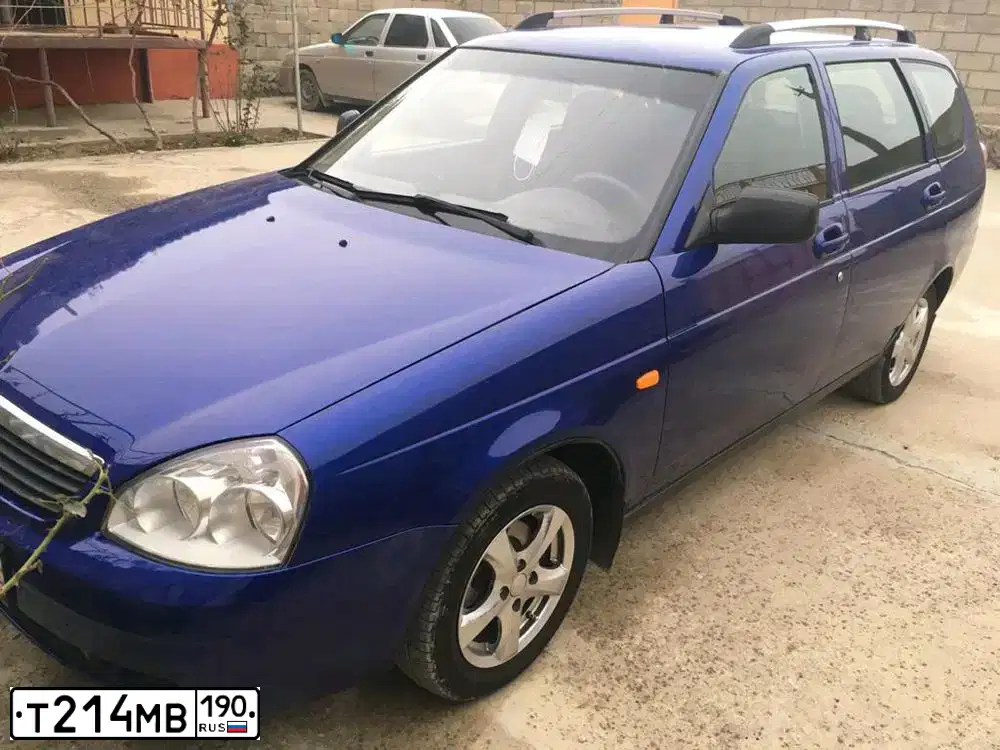 Фото автомобиля LADA 2171 PRIORA, 2010 — госномер Т214МВ190. Цвет: синий