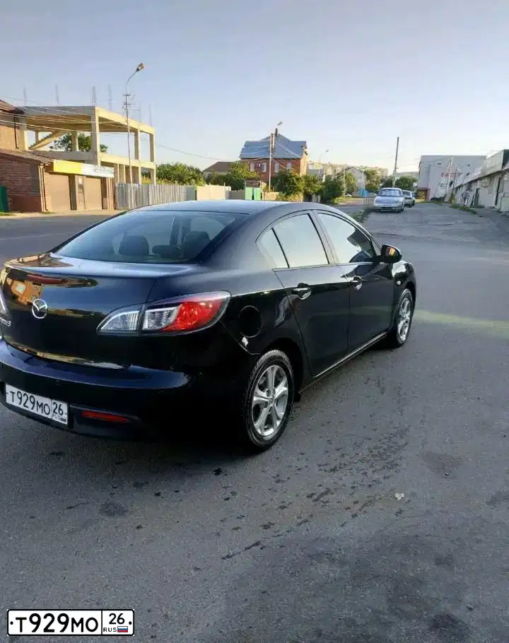 Фото автомобиля MAZDA 3, 2011 — госномер Т929МО26. Цвет: ЧЕРНЫЙ