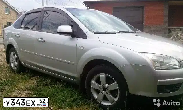 Фото автомобиля FORD FOCUS, 2007 — госномер У343ЕХ52. Цвет: Серебристый