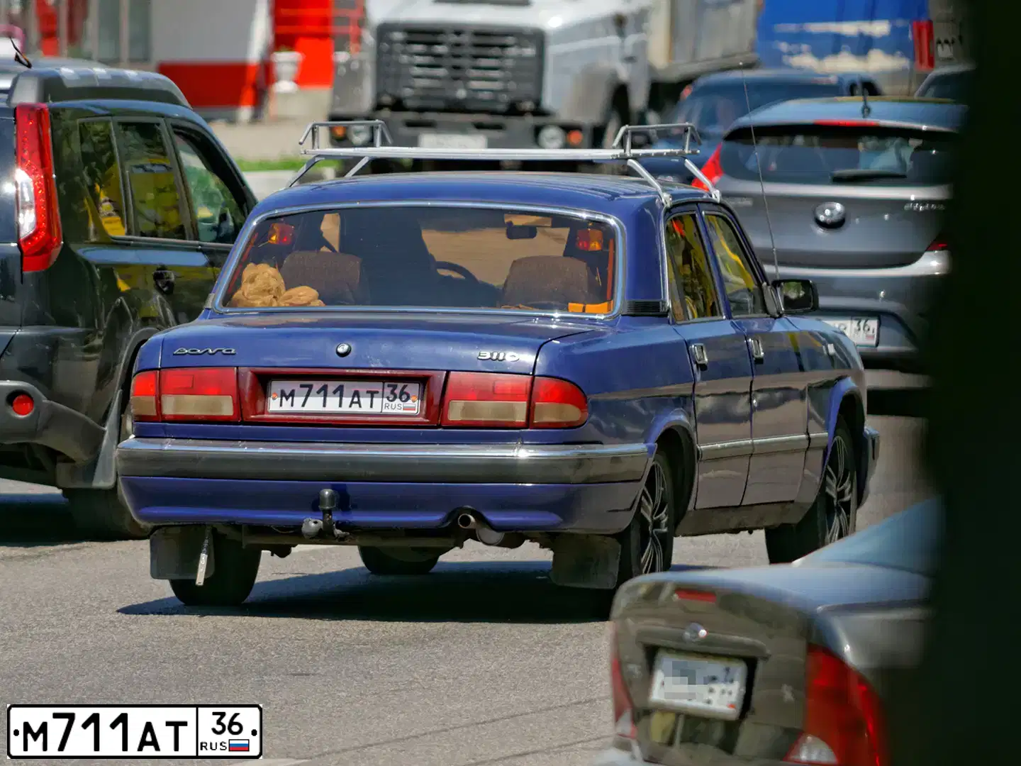 Фото автомобиля ГАЗ 3110, 2000 — госномер Н329НМ136. Цвет: синий