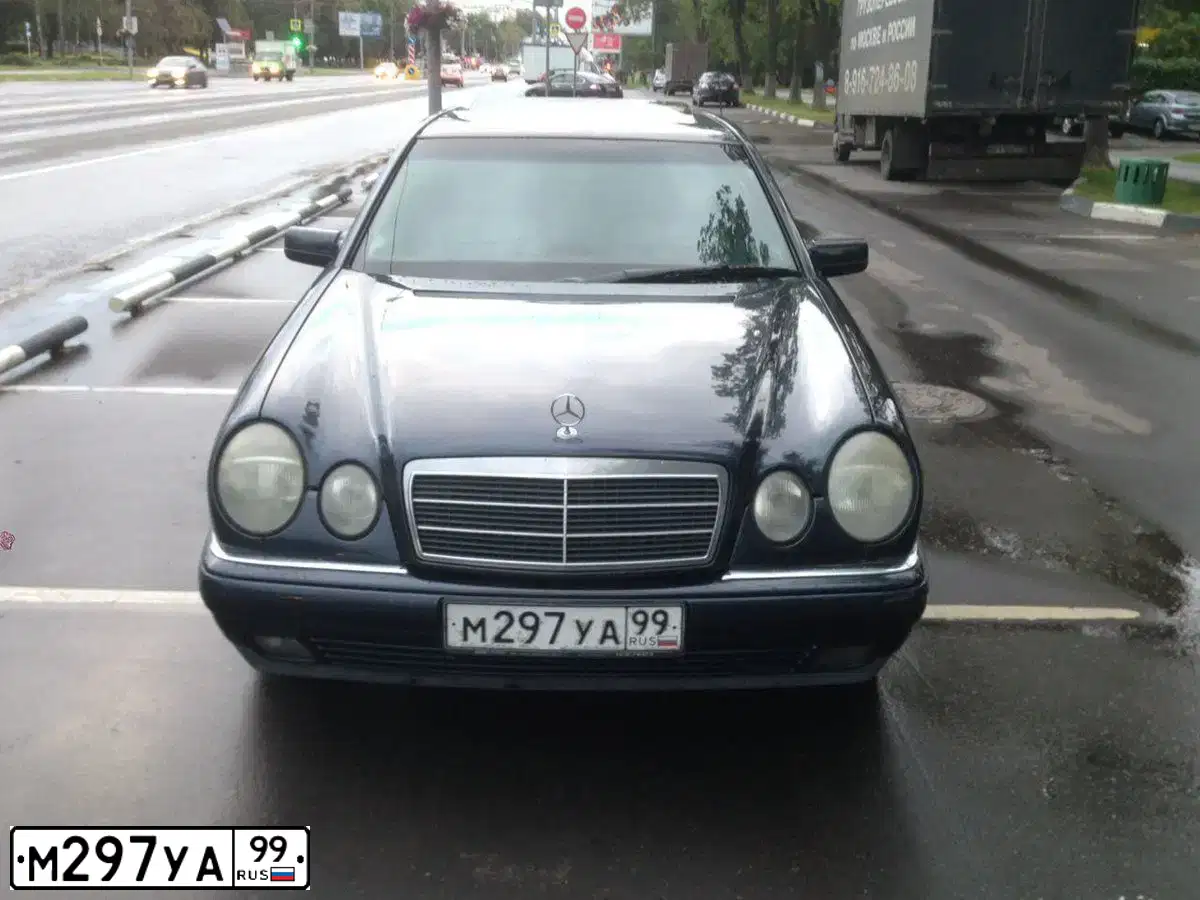 Фото автомобиля MERCEDES E-KLASSE, 1997 — госномер М297УА99. Цвет: ЧЕРНЫЙ