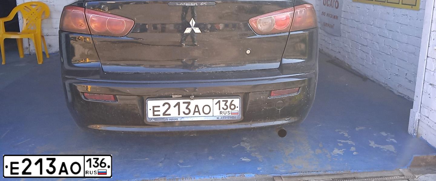 Фото автомобиля MITSUBISHI LANCER, 2008 — госномер Р955ОА32. Цвет: ЧЕРНЫЙ