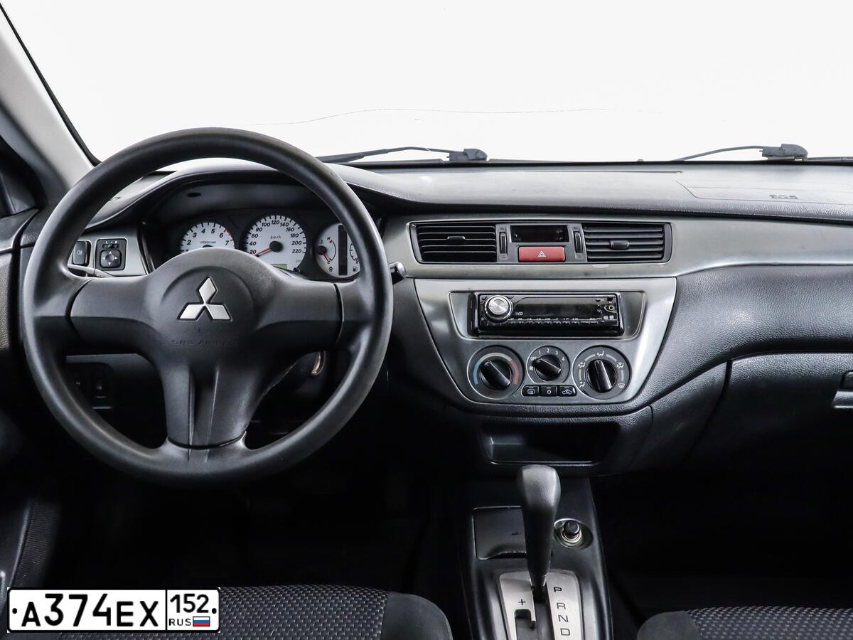 Фото автомобиля MITSUBISHI LANCER, 2007 — госномер Т281АХ198. Цвет: Серебристый
