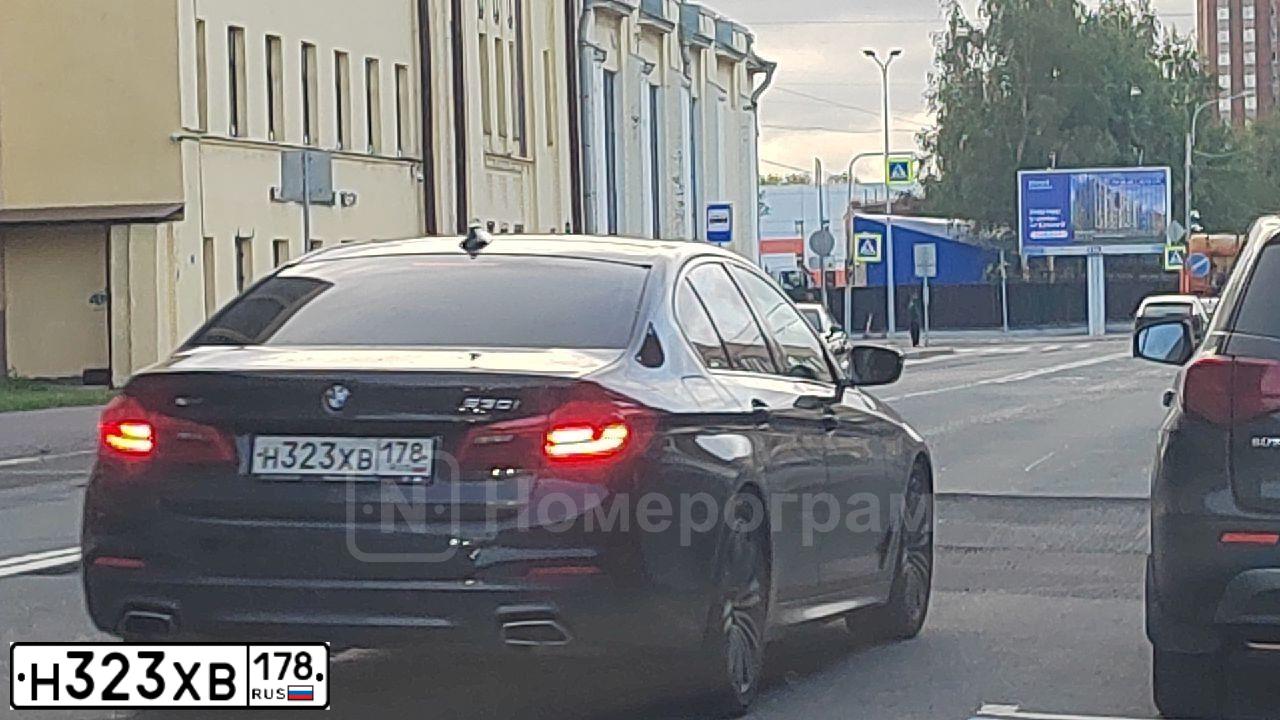 Фото автомобиля AUDI A5, 2013 — госномер Н323ХВ178. Цвет: ЧЕРНЫЙ