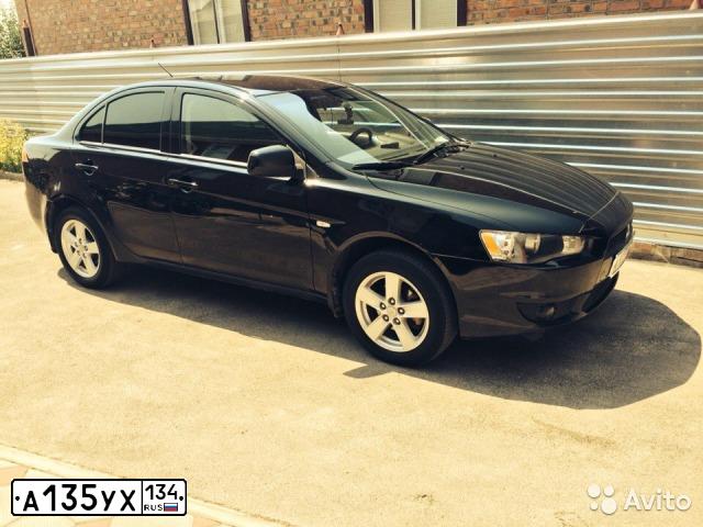 Фото автомобиля MITSUBISHI LANCER, 2008 — госномер М707ОЕ34. Цвет: ЧЕРНЫЙ